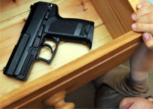 Gun Safety | Child reaching for gun in drawer at home | Lock N More